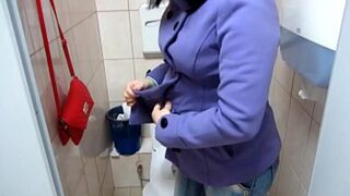 Public restroom MILF urinates then strips down for solo play