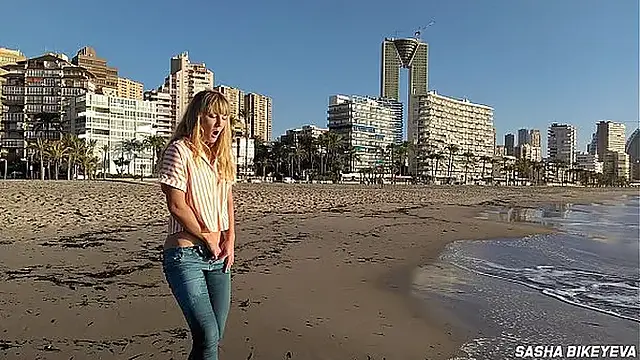 Risky masturbation on a public beach in Benidorm  Fetish Wet Sneakers  The girl pees beautifully in jeans  Fingering  Russian pornstar Sasha Bikeyeva